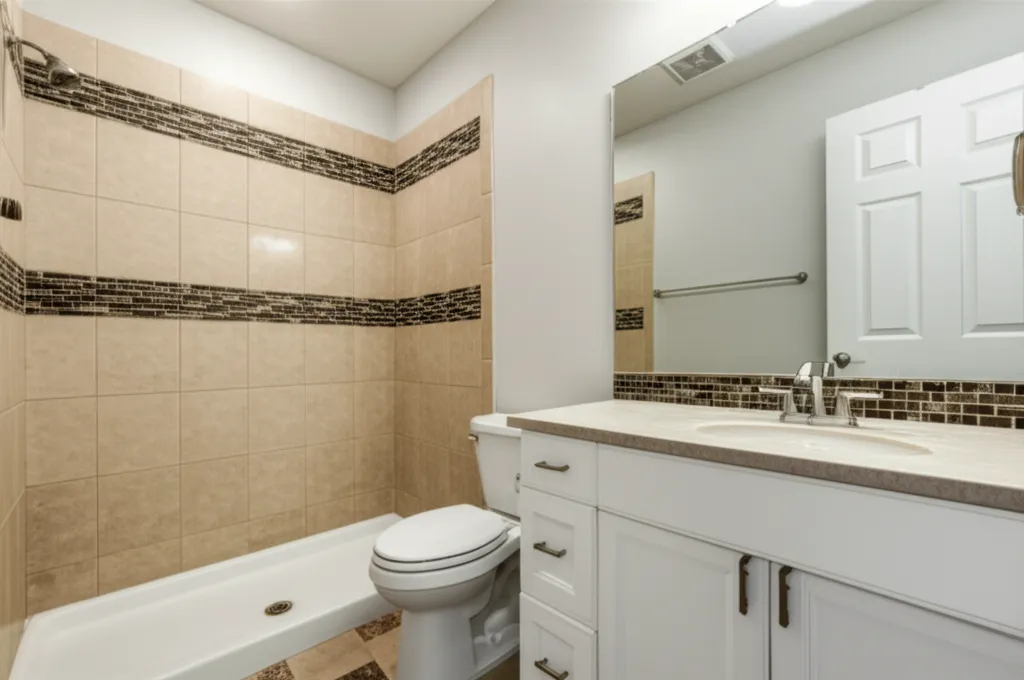 Classic 1990s Antelope tract bathroom with white ceramic tile and builder-grade fixtures