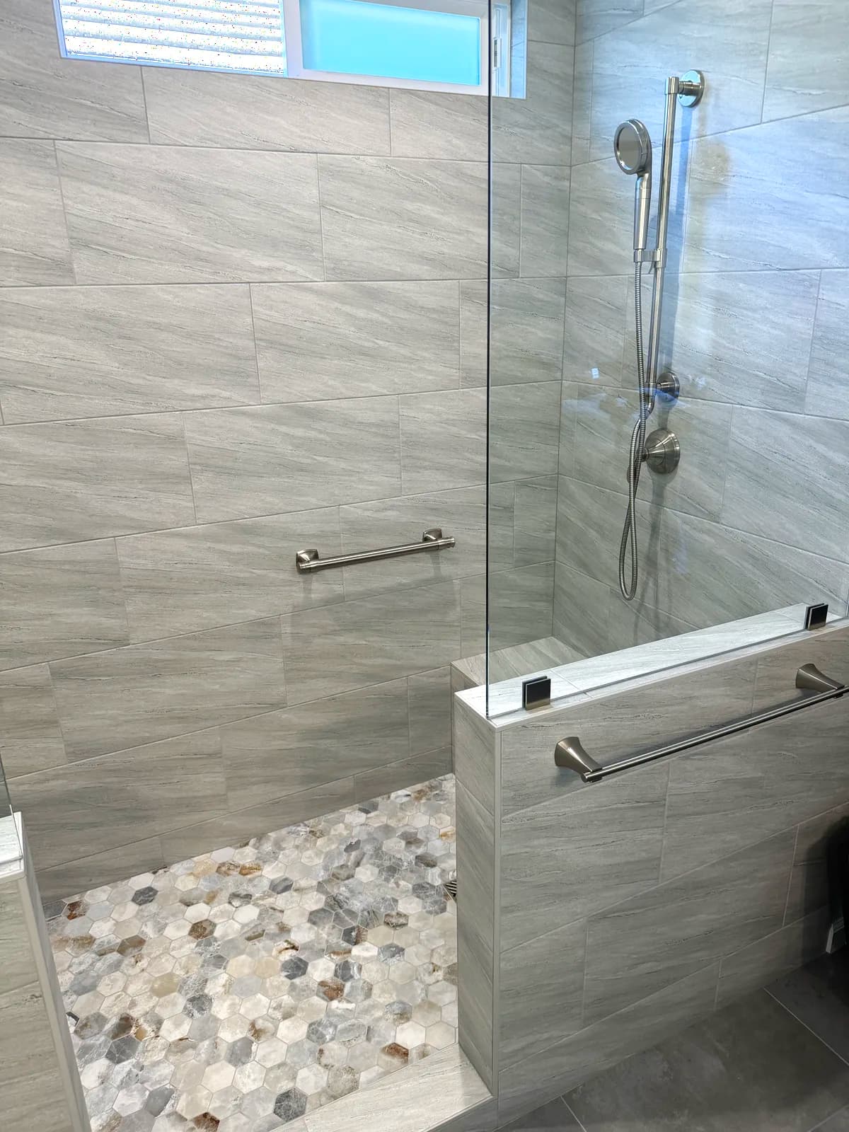 After: tiled bench under the shower window with grab bar