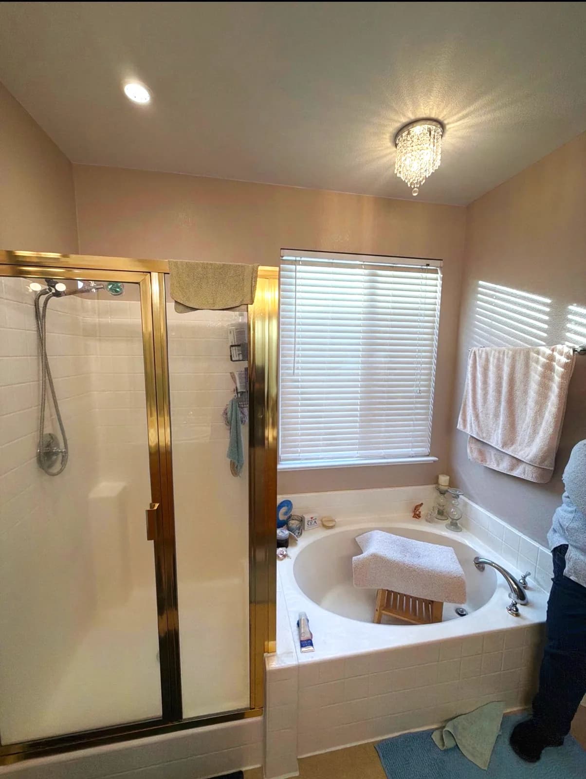 Before: Citrus Heights master bathroom with double vanity, Hollywood strip lights and plate mirror