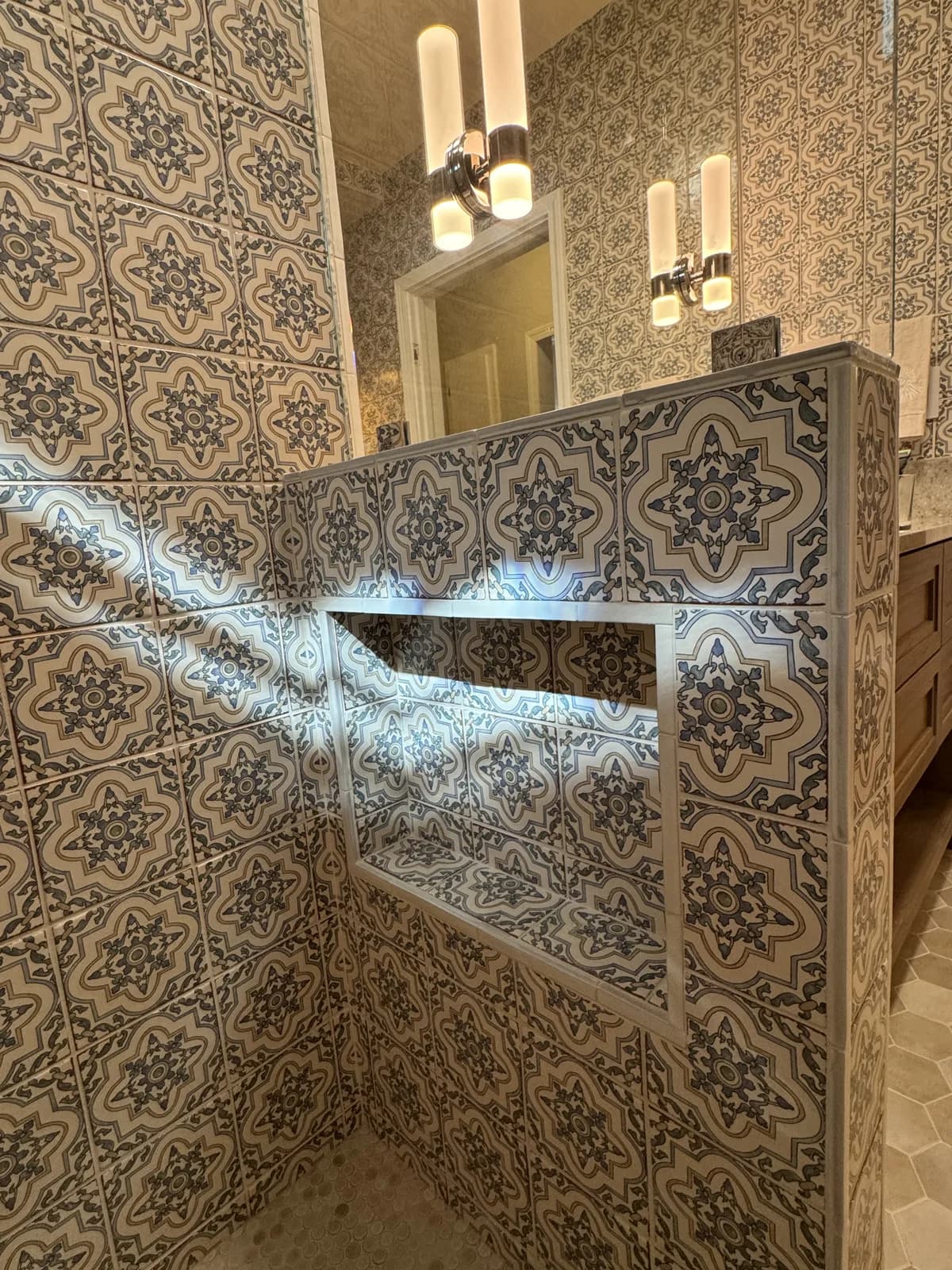 After: Arden bathroom shower window with mini-blinds set into vintage Moroccan tile walls