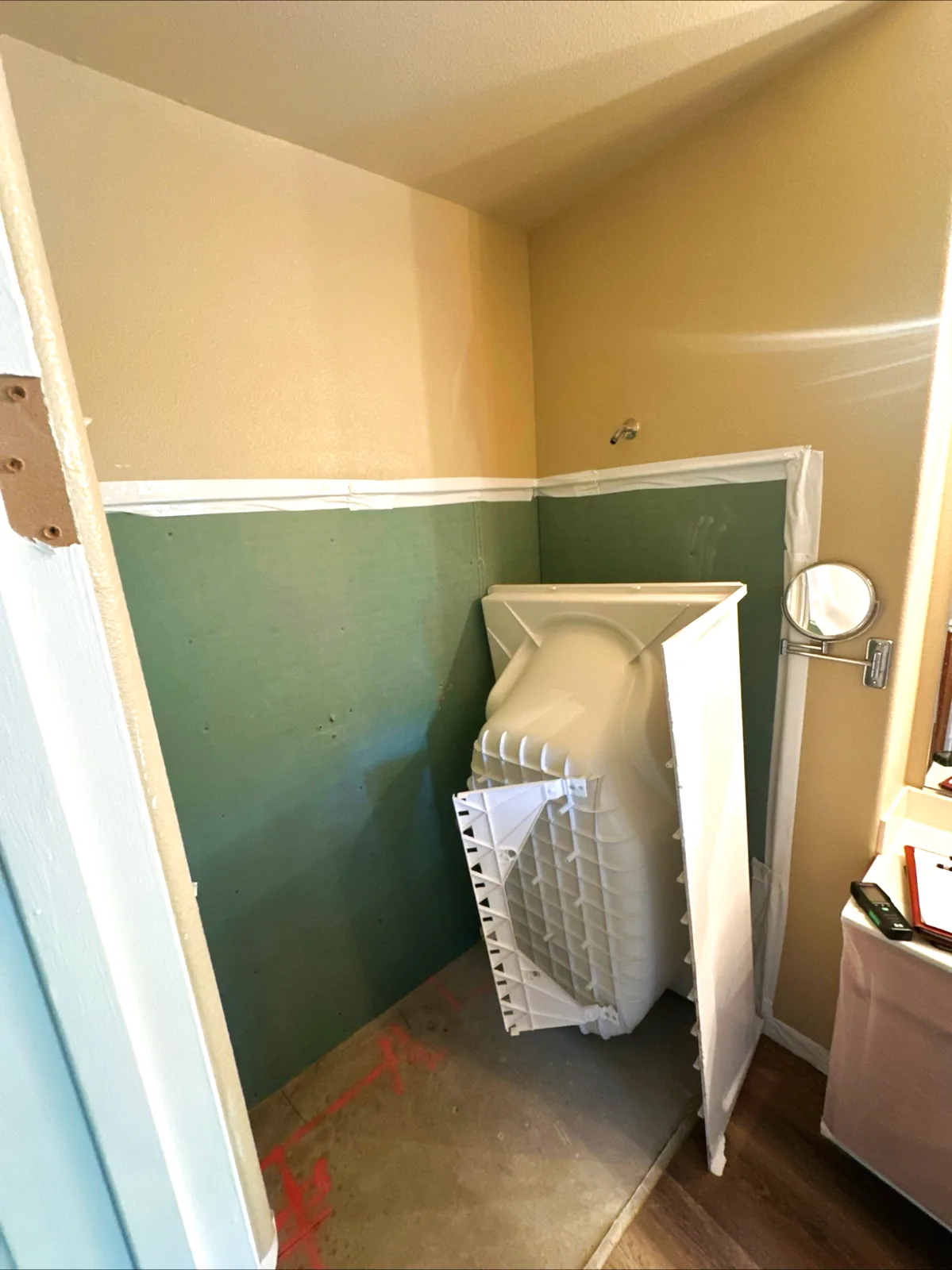 Before: small shower nook with painted wainscot walls in a Natomas, Sacramento bathroom